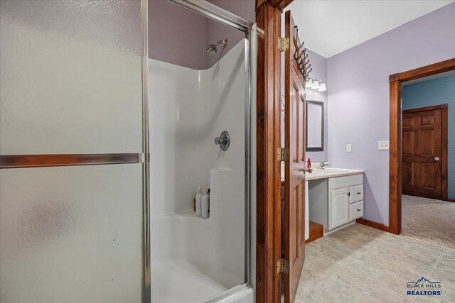 19329 US Highway 85, Belle Fourche, SD 57717 - bathroom with a stall shower, baseboards, and vanity