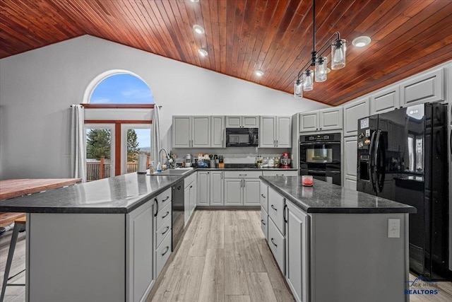19329 US Highway 85, Belle Fourche, SD 57717 - kitchen featuring wooden ceiling, a sink, a kitchen island, light wood-type flooring, and black appliances