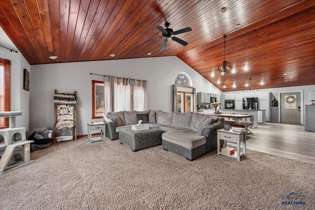19329 US Highway 85, Belle Fourche, SD 57717 - living area featuring a ceiling fan, wooden ceiling, lofted ceiling, and light carpet