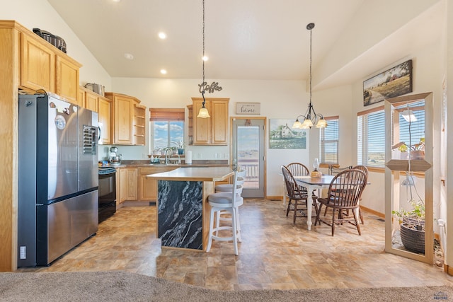 kitchen featuring a kitchen island, open shelves, freestanding refrigerator, light brown cabinets, and electric range