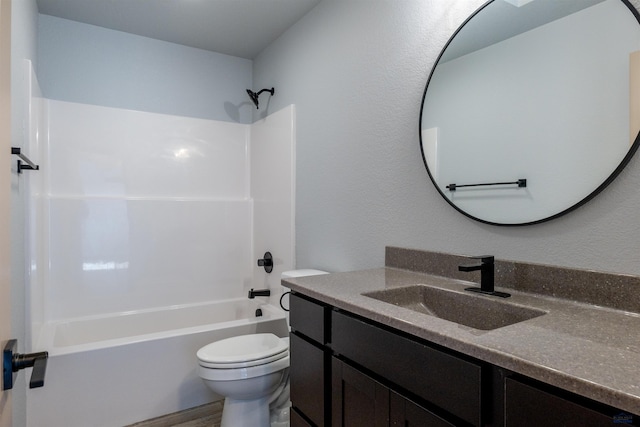 bathroom featuring toilet, shower / tub combination, and vanity