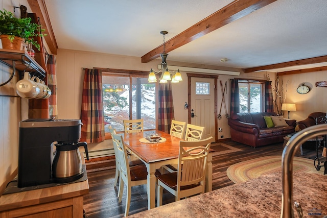 dining space featuring a baseboard radiator, dark wood-style floors, and beamed ceiling