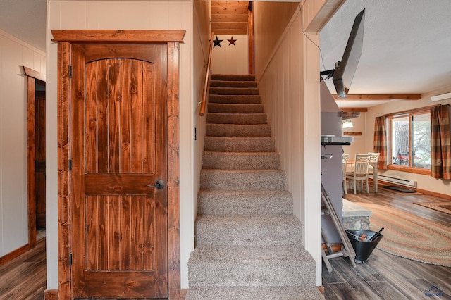 stairs with wood finished floors