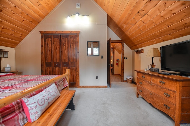 bedroom with baseboards, lofted ceiling, and wood ceiling