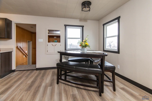 1920 Reservoir Rd, Rapid City, SD 57703 - dining space with baseboards and light wood-style floors