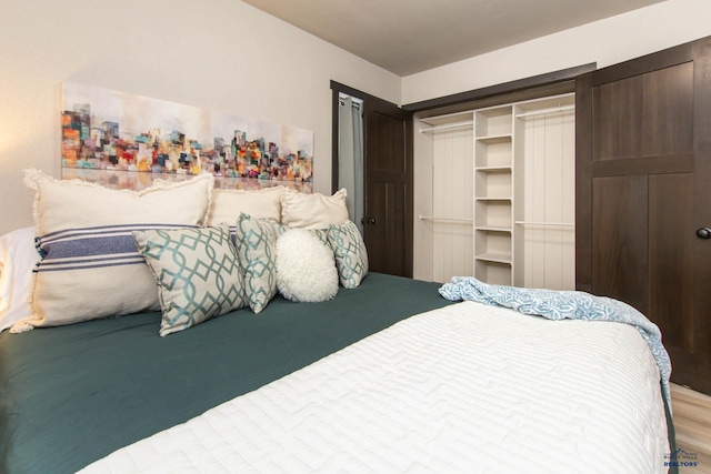 1920 Reservoir Rd, Rapid City, SD 57703 - bedroom featuring a closet and wood finished floors