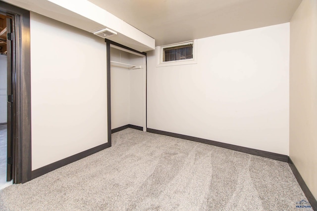1920 Reservoir Rd, Rapid City, SD 57703 - finished basement with baseboards, visible vents, and carpet