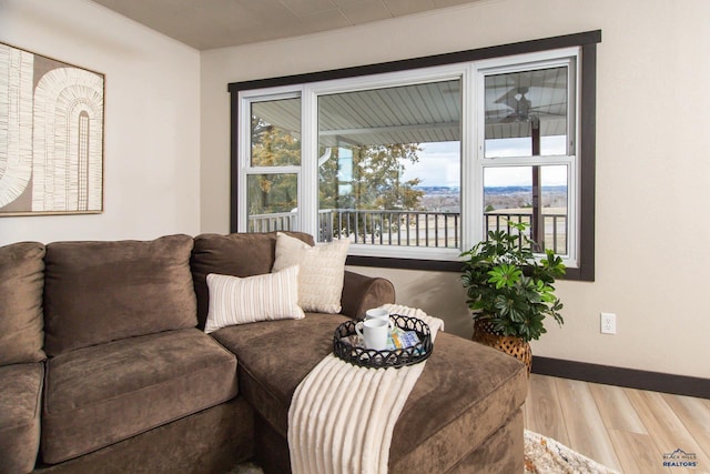 1920 Reservoir Rd, Rapid City, SD 57703 - living room featuring baseboards and wood finished floors