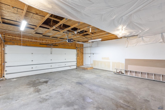 garage featuring a garage door opener