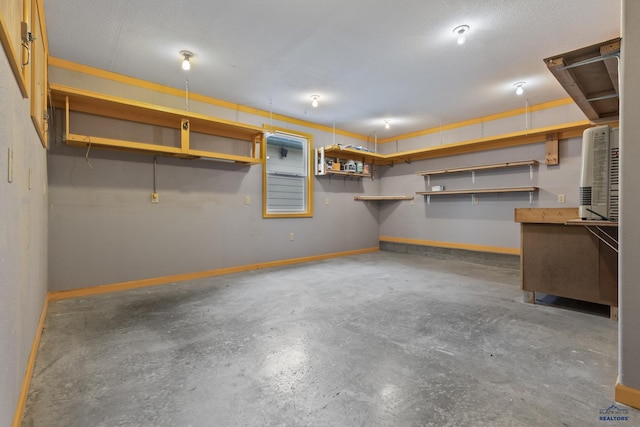 2506 Junction Dr, Rapid City, SD 57702 - garage featuring baseboards
