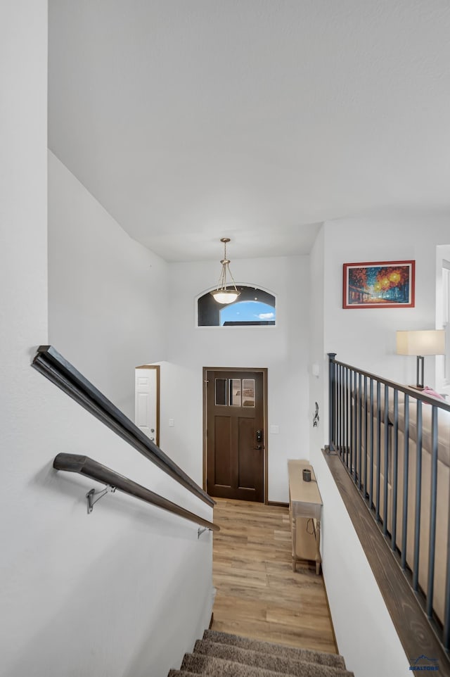 4400 Beringer Dr, Rapid City, SD 57703 - entrance foyer with wood finished floors and stairway