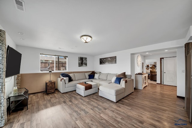 4400 Beringer Dr, Rapid City, SD 57703 - living room featuring visible vents, recessed lighting, and wood finished floors