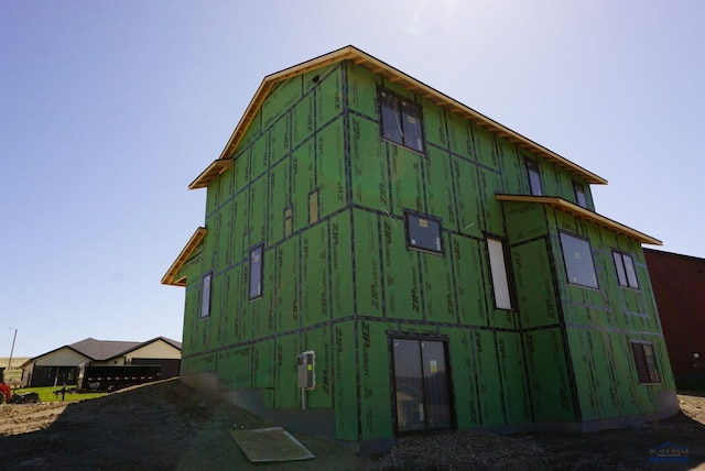 3042 Rombauer Dr, Rapid City, SD 57703 - view of side of home featuring board and batten siding