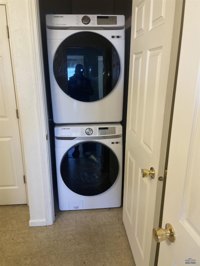 1111 Silver St, Rapid City, SD 57701 - laundry room with stacked washer / dryer and laundry area