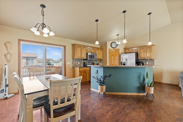 dining room featuring dark wood finished floors, baseboards, lofted ceiling, and a chandelier