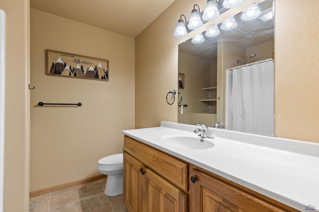 bathroom featuring baseboards, curtained shower, toilet, and vanity