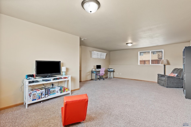 rec room featuring baseboards and carpet