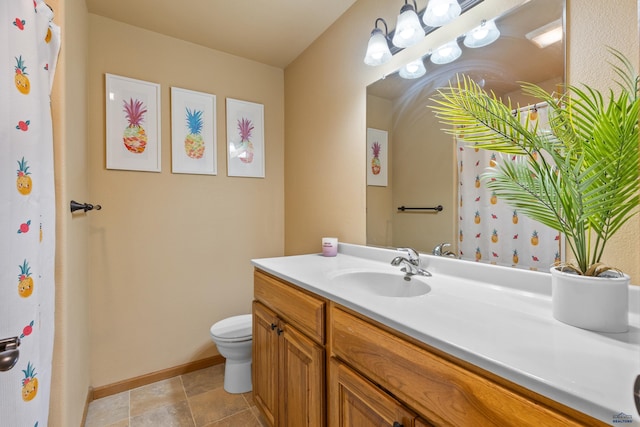 full bathroom with baseboards, toilet, and vanity