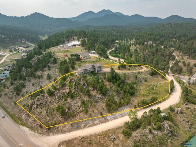 23863 Emerald Pines Dr, Hill City, SD 57745 - aerial view with a wooded view and a mountain view