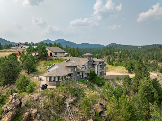 23863 Emerald Pines Dr, Hill City, SD 57745 - aerial view with a wooded view and a mountain view