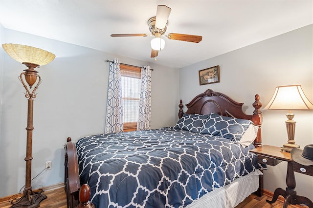 4024 W Main, Rapid City, SD 57702 - bedroom featuring baseboards, ceiling fan, and wood finished floors
