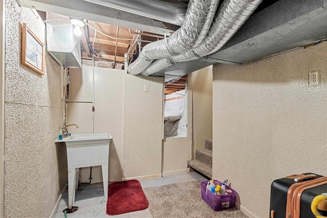 4024 W Main, Rapid City, SD 57702 - unfinished below grade area with a textured wall and baseboards