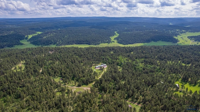 aerial view featuring a forest view