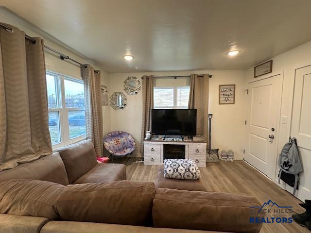 living area with wood finished floors