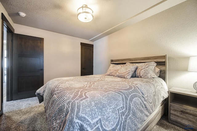 21260 Ridgewood Trl, Lead, SD 57754 - carpeted bedroom featuring a textured ceiling