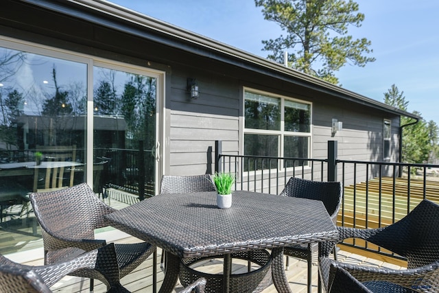 21260 Ridgewood Trl, Lead, SD 57754 - wooden deck featuring outdoor dining area