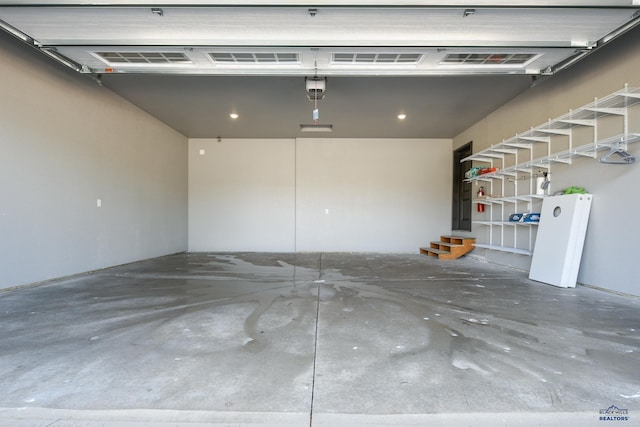 21260 Ridgewood Trl, Lead, SD 57754 - garage featuring a garage door opener