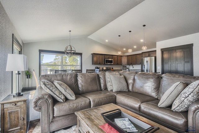 21260 Ridgewood Trl, Lead, SD 57754 - living room featuring a textured ceiling, lofted ceiling, and a chandelier