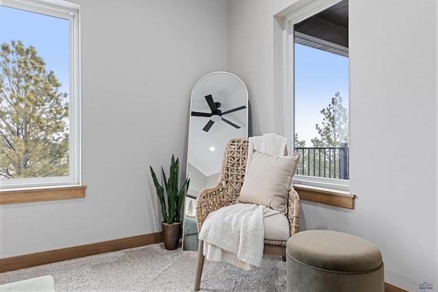 1230 Pinnacle Ct, Rapid City, SD 57701 - living area featuring plenty of natural light, carpet, baseboards, and ceiling fan