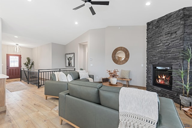 1230 Pinnacle Ct, Rapid City, SD 57701 - living area featuring ceiling fan, light wood-type flooring, recessed lighting, vaulted ceiling, and a stone fireplace