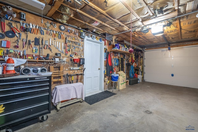 37 Washington St, Deadwood, SD 57732 - garage with a workshop area