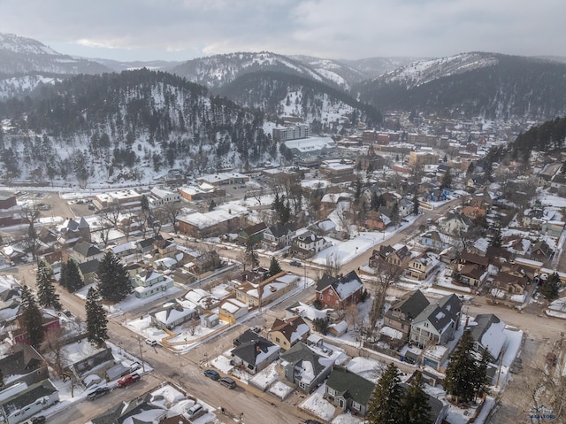 37 Washington St, Deadwood, SD 57732 - snowy aerial view featuring a residential view and a mountain view