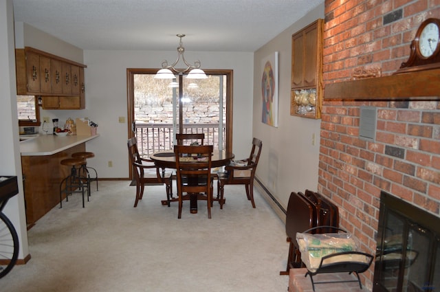 1521 Forest Ct, Rapid City, SD 57701 - dining area featuring baseboards, a baseboard radiator, light carpet, and a chandelier