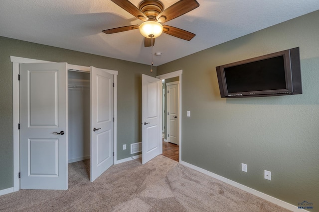 4153 Augusta Dr, Rapid City, SD 57703 - unfurnished bedroom with baseboards, carpet flooring, visible vents, and a closet