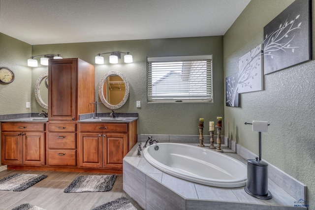 4153 Augusta Dr, Rapid City, SD 57703 - full bath with a sink, double vanity, a textured wall, and a garden tub