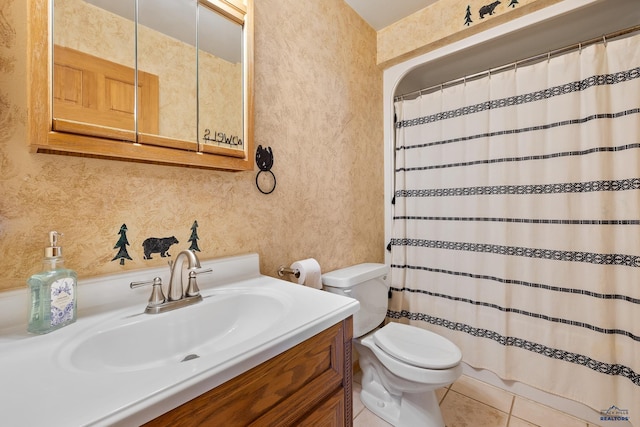 24354 Rushmore Ranch Rd, Keystone, SD 57751 - bathroom with vanity, toilet, tile patterned floors, wallpapered walls, and curtained shower