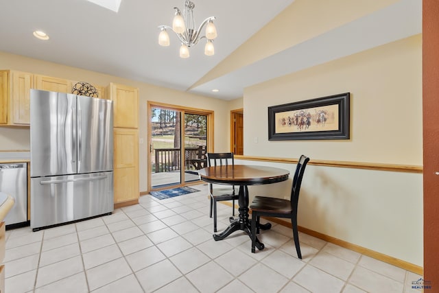 24354 Rushmore Ranch Rd, Keystone, SD 57751 - dining room with light tile patterned flooring, vaulted ceiling, a notable chandelier, baseboards, and recessed lighting
