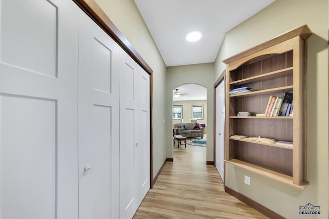 3129 Hazelnut Ln, Rapid City, SD 57703 - hall featuring light wood-type flooring and baseboards