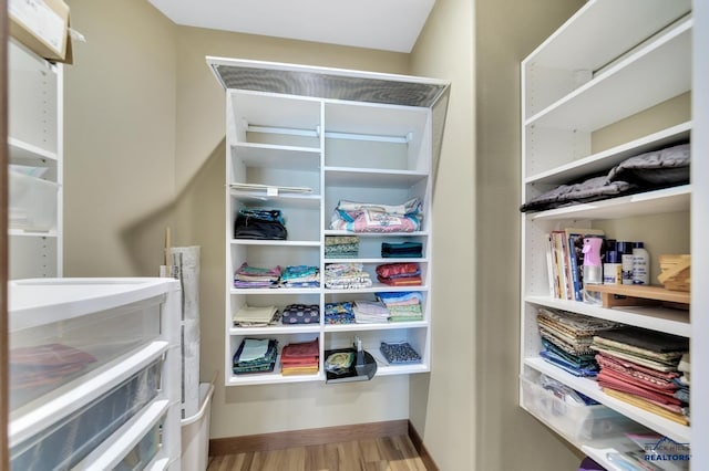 3129 Hazelnut Ln, Rapid City, SD 57703 - spacious closet with wood finished floors