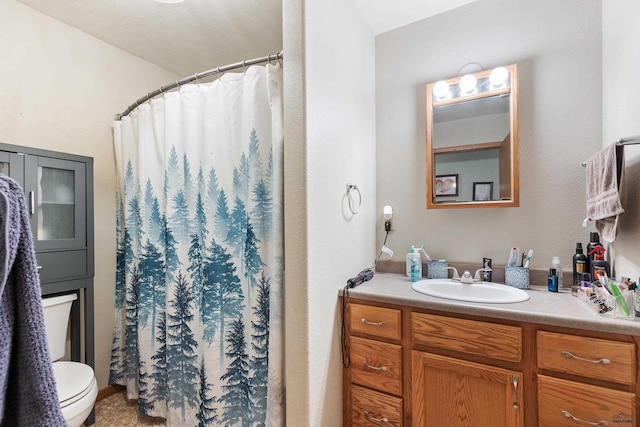 524 Mall Dr, Rapid City, SD 57701 - full bathroom with a shower with shower curtain, toilet, and vanity