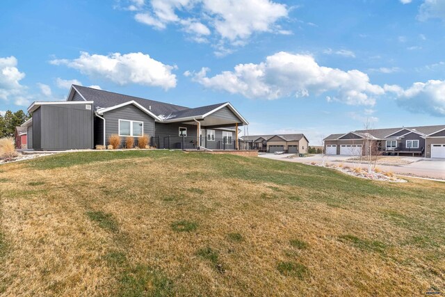 4403 Targhee Dr, Rapid City, SD 57702 - view of front of house with a front lawn