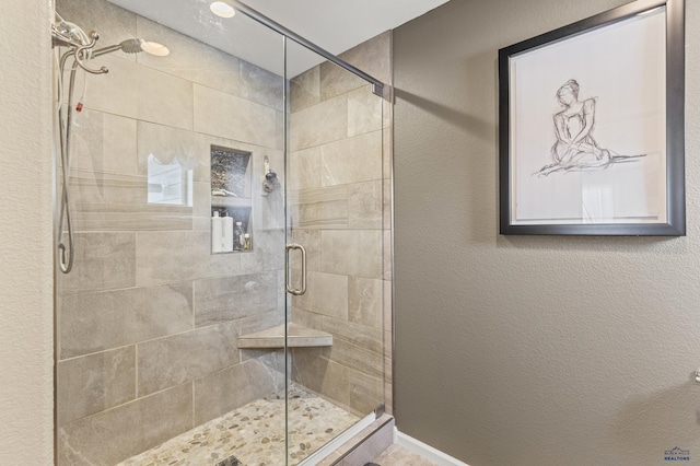 2750 Tumble Weed Trl, Spearfish, SD 57783 - bathroom with a shower stall and a textured wall