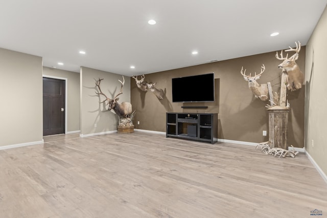 2750 Tumble Weed Trl, Spearfish, SD 57783 - unfurnished living room with recessed lighting, baseboards, and wood finished floors