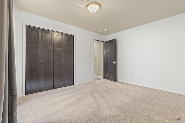 2750 Tumble Weed Trl, Spearfish, SD 57783 - unfurnished bedroom with a closet, carpet flooring, baseboards, and visible vents