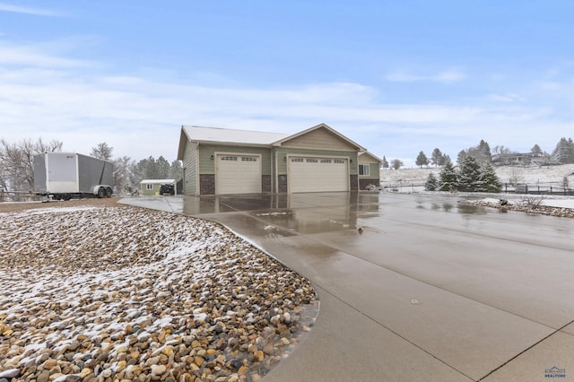 2750 Tumble Weed Trl, Spearfish, SD 57783 - garage featuring concrete driveway