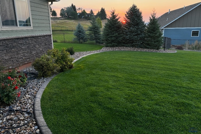 2750 Tumble Weed Trl, Spearfish, SD 57783 - yard at dusk with fence